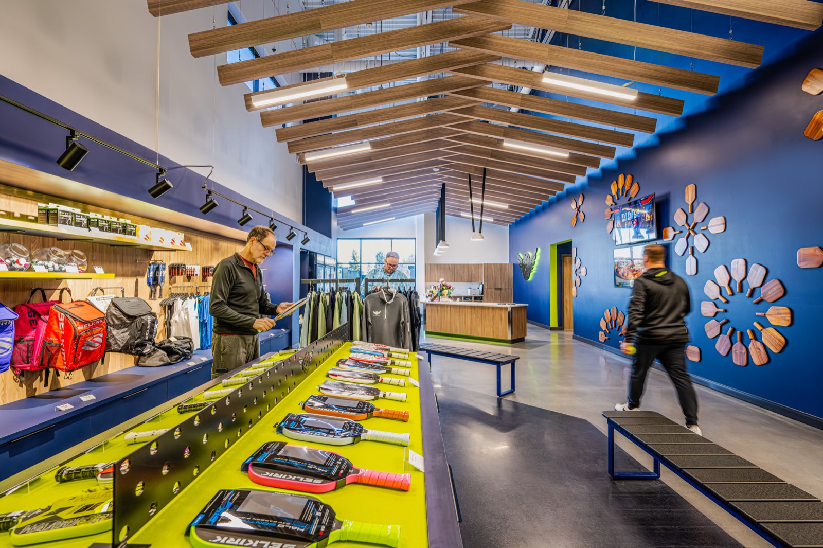 The pro shop at The Flying Pickle stocked with paddles, bags, and apparel